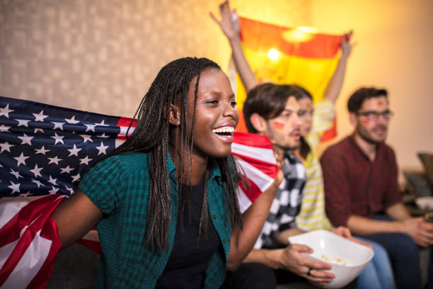 istock Supporters rejoices watching television 1063101212