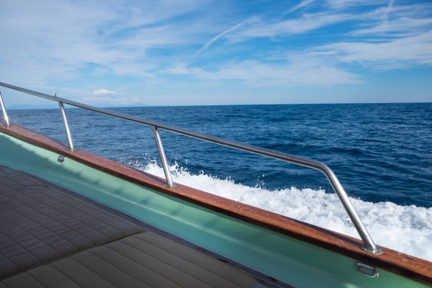istock Boat Sailing Through the Ocean 1063127160