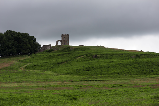 Mediaeval Corfe Ruins with Poole in distnace