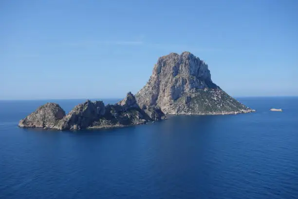 This is a sunny shot of the island of Es Vedre in Ibiza Spain