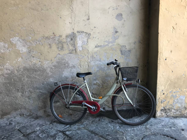 istock Child's Bike Against Wall 1063148770