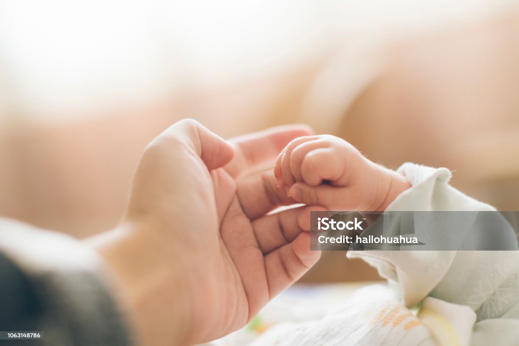 Photo of newborn baby fingers Baby, Newborn, Hand, Pregnant, Sleeping Baby - Human Age Stock Photo