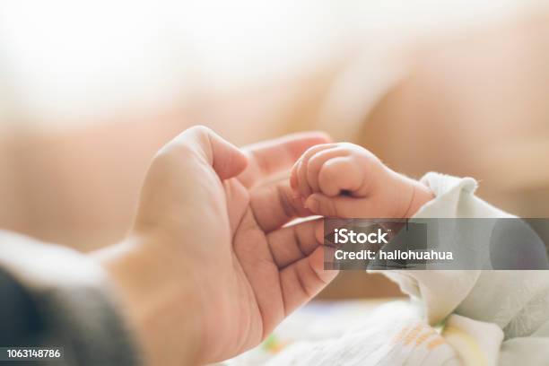 Photo Of Newborn Baby Fingers Stock Photo - Download Image Now - Baby - Human Age, Mother, Newborn