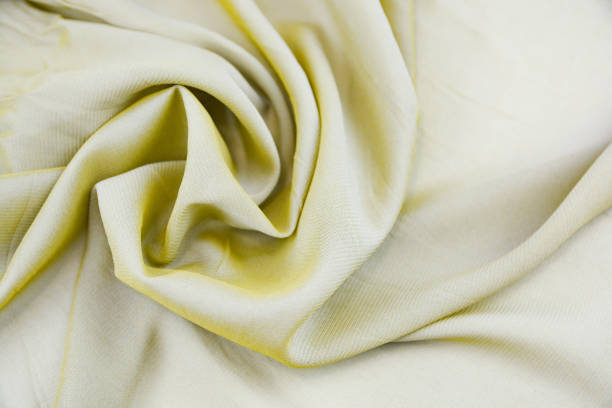 istock Texture of draped satin and silk fabric for backgrounds 1063155826