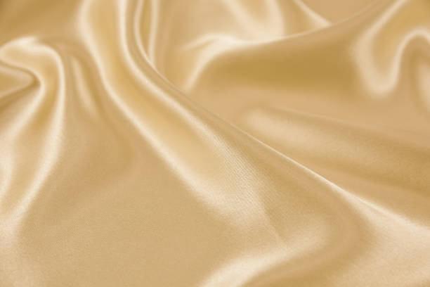 istock Texture of draped satin and silk fabric for backgrounds 1063155902