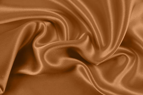 istock Texture of draped satin and silk fabric for backgrounds 1063155906