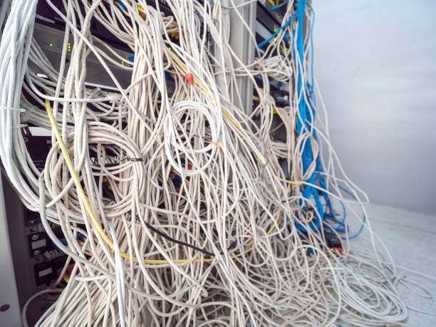 istock The tangled cable chaos on the network room 1063159710