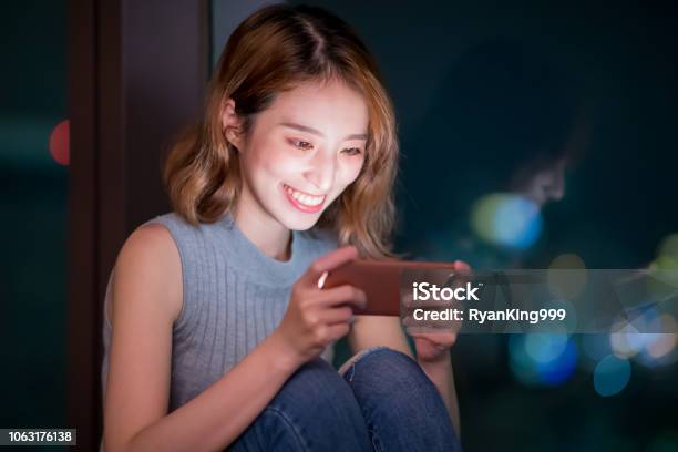 Woman Play Mobile Game Stock Photo - Download Image Now - Mobile Phone, Mobile Game, Playing