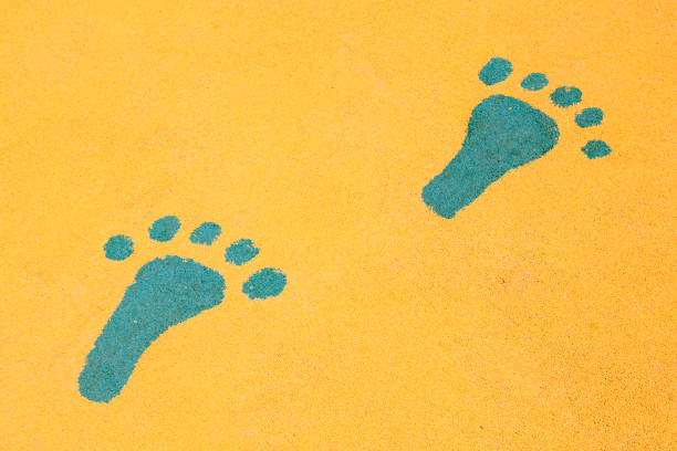 istock footprints are on the yellow ground 1063195328