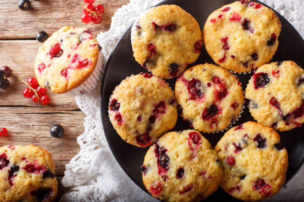 istock berry muffin with black and red currant close-up. Horizontal top view from above 1063196072