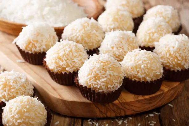 Brazilian coconut kisses (beijinhos de coco — also known simply as beijinhos or branquinhos) are traditionally made from a mixture of sweetened condensed milk, coconut flakes, and butter