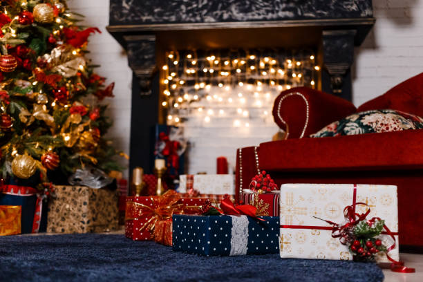 istock beautiful black fireplace with Christmas Garland 1063202616