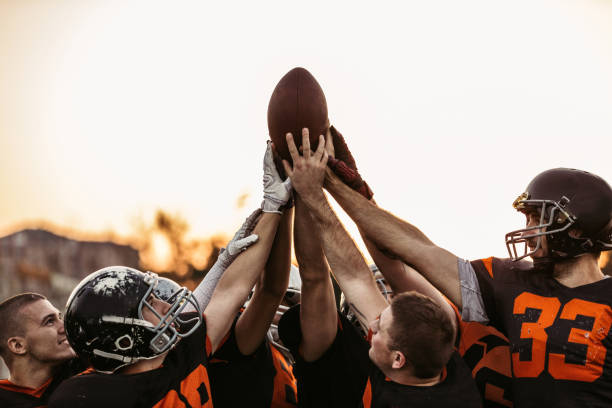 istock Football Players Huddling 1063210128