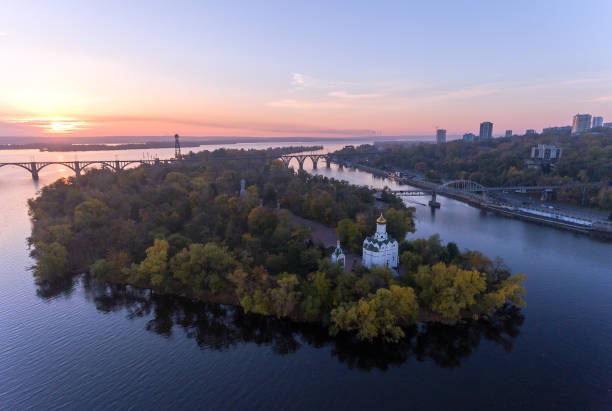 Aerial Flight over the Christian Church in the Monastic island, Dnepr City, Ukraine (Dnipro, Dnepropetrovsk, Dnipropetrovsk) Beautiful autumn on the River Dnieper, Christian Church in the Monastic island, Dnepr City, Ukraine (Dnipro, Dnepropetrovsk, Dnipropetrovsk) dnipropetrovsk stock pictures, royalty-free photos & images