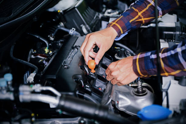 istock Close up hands checking lube oil level of car engine from deep-stick for service and maintenance concept. 1063255586