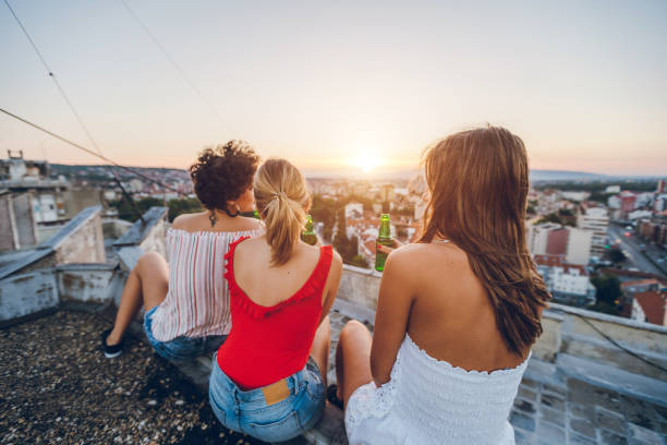 istock Rooftop party friends 1063260070