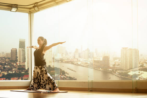 istock A yoga master practicing yoga performing a stand pose 1063261456