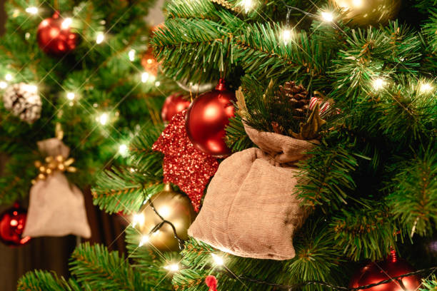 istock Close up christmas tree decorated with christmas balls and light 1063261650