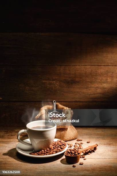 A Cup Of Black Coffee Or Americano With Roasted Coffee Bean In Bag Good Coffee For Health Is Black Coffee Without Sugar And Milk Stock Photo - Download Image Now