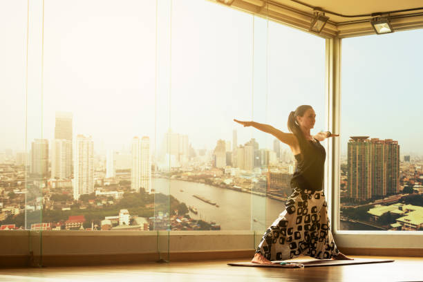 istock A yoga master practicing yoga performing a stand pose 1063262646