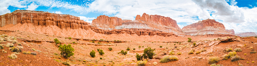 Panoramic view of beautiful desert landscape with blue sky and clouds in Capitol Reef National Park, central Utah, USA