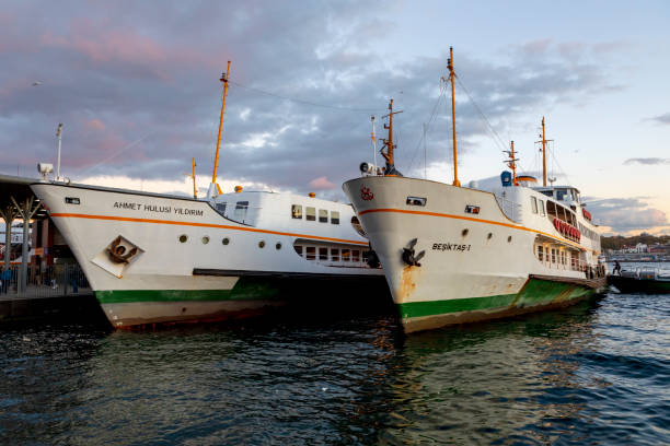 Istanbul, Turkey - October 25, 2018: Ferry in Karakoy pier. Port looks everyday life. Istanbul Ferries continue to serve as a key public transport link for many Thousands of commuters, tourists and vehicles per day.