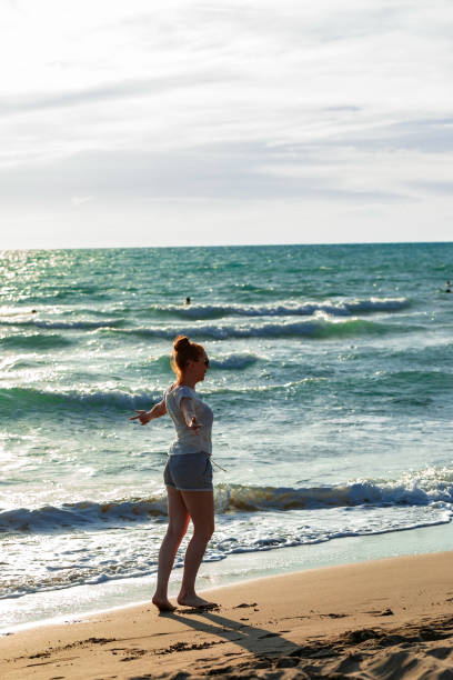 istock Woman at Beach 1063266294