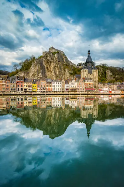 Classic view of the historic town of Dinant with scenic River Meuse in beautiful golden evening light at sunset, province of Namur, Wallonia, Belgium