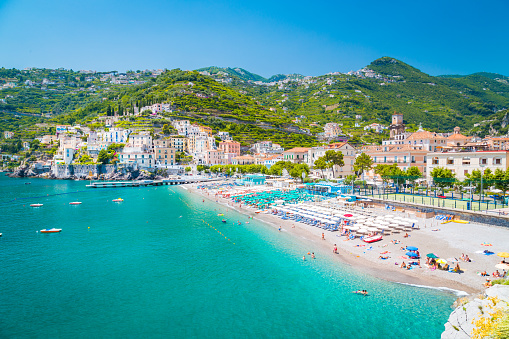 Scenic panoramic view of the beautiful town of Amalfi at famous Amalfi Coast with Gulf of Salerno in summer, Campania, Italy