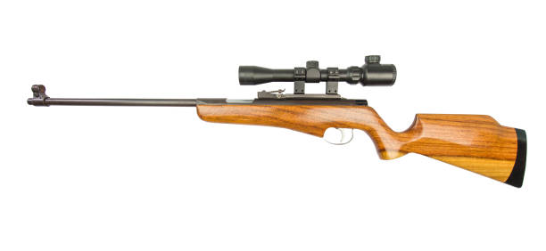 istock rifle target view ,sniper rifle isolated on white background. 1063277956