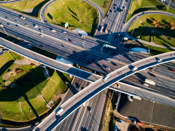 istock Aerial view of a freeway intersection traffic trails in Moscow. 1063280118