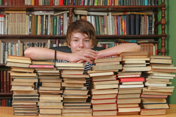 istock Teenager in Library 1063286664
