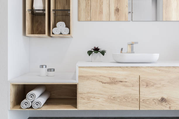 istock Wooden bathroom, white sink close up 1063289522