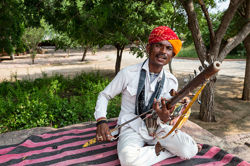 A folk singer with his Ravanahatha instrument met on August 10, 2018 on the outskirts of Jaipur, Rajasthan County, India.
