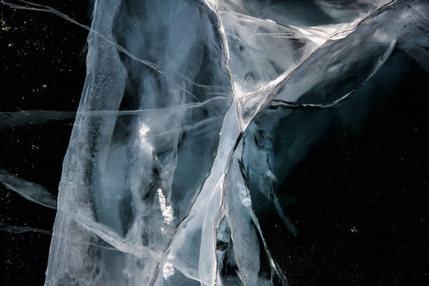 istock Blue cracked surface of the ice surface 1063291878