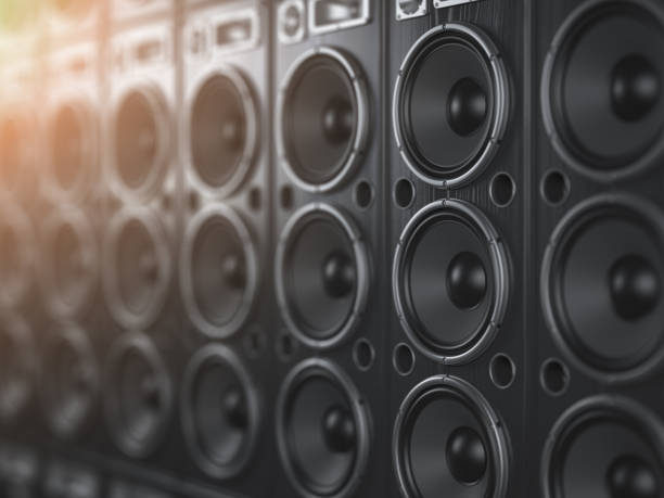 Audio sound speaker system. Black loudspeakers in a row with DOF effect. Music club background. Audio sound speaker system. Black loudspeakers in a row with DOF effect. Music club background. 3d illustration rock n roll music speakers stock pictures, royalty-free photos & images