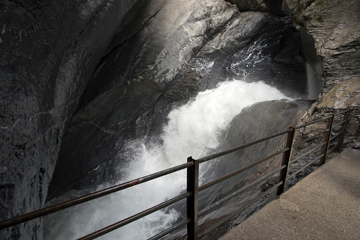 The Trümmelbach Falls in Switzerland. These falls are a series of ten glacier-waterfalls inside the mountain made accessible by tunnel-lift and illuminated.