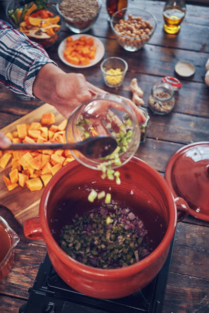istock Preparing Pumpkin Stew with Chickpeas, Celery and Lentils 1063299342