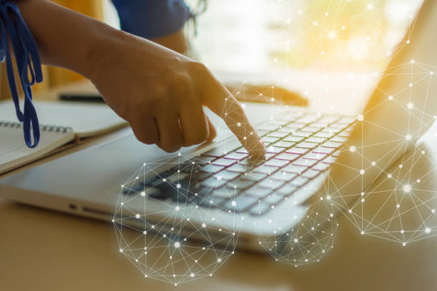 istock Use laptops for global network connectivity. business concept warm tone. 1063299634