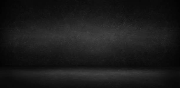 istock gray and black cement wall studio background, blank room and empty banner 1063299788