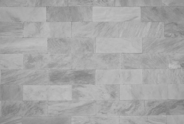 istock white and gray texture marble and brick wall background 1063300986