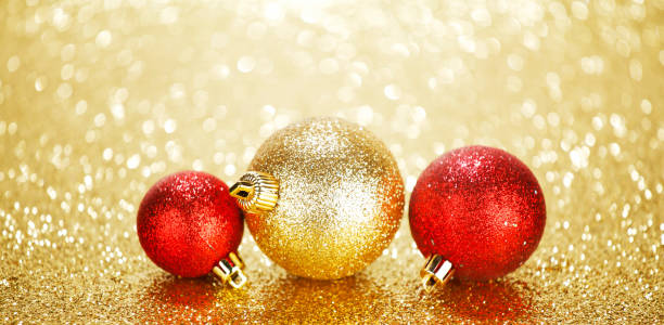 istock Three beautiful chritmas balls on shiny glitters 1063301700