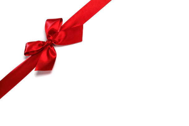 istock Decorative red satin bow isolated on white background 1063301740