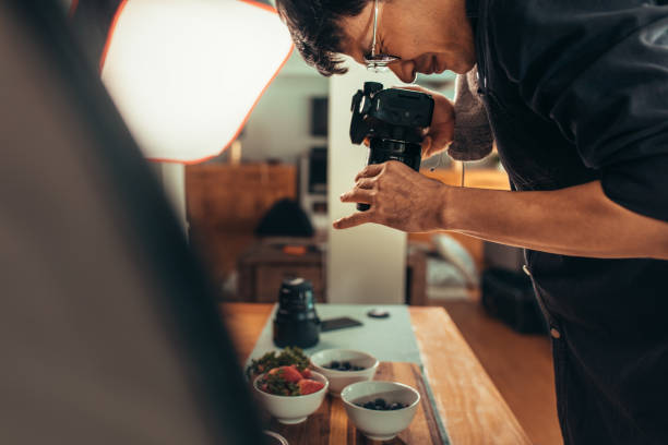 istock Photographer taking food pictures in studio 1063303368
