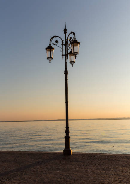 istock Beautiful sunset at Garda lake in Italy 1063303490