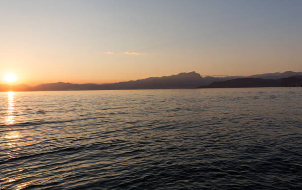 istock Beautiful sunset at Garda lake in Italy 1063303624