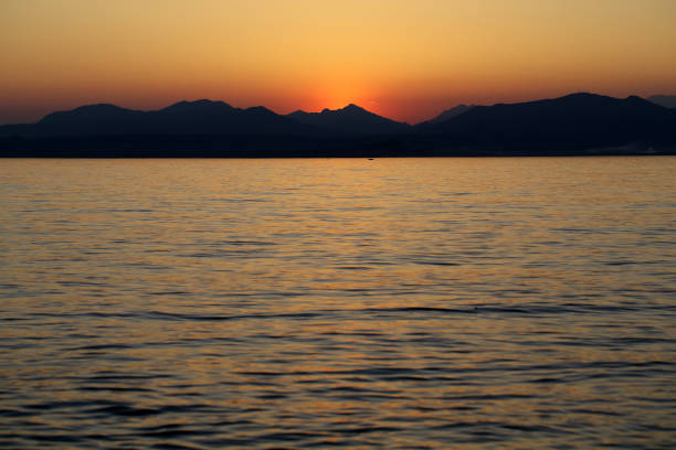 istock Beautiful sunset at Garda lake in Italy 1063303694