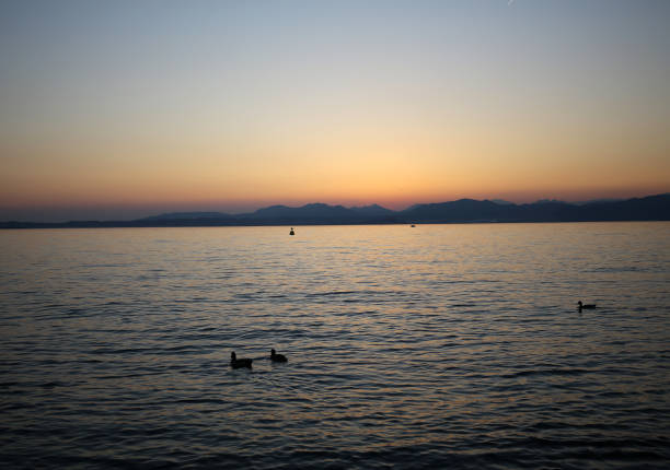 istock Beautiful sunset at Garda lake in Italy 1063303736