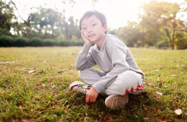 istock Cute children playing in the park 1063308720