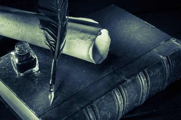 istock Quill pen and old book 1063308898